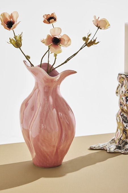 vas med blommor från homeroom